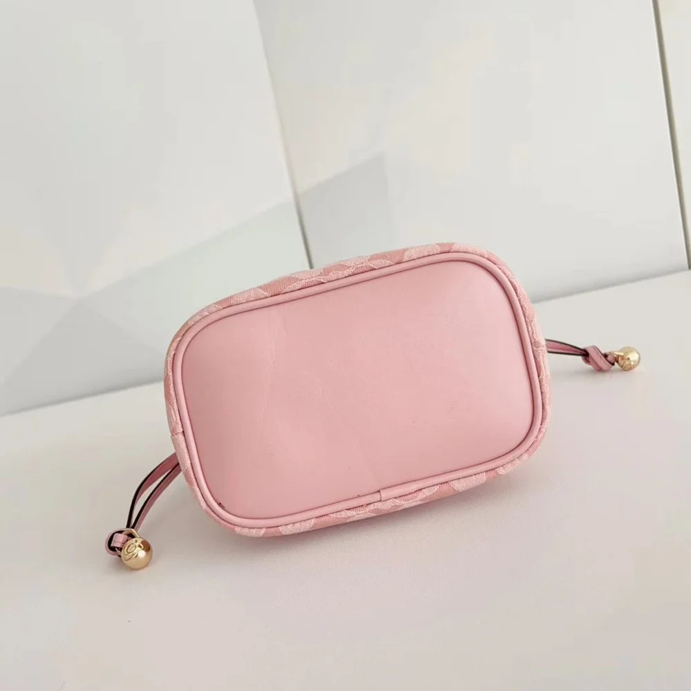 Coach Pink Signature Jacquard Mini Bucket Drawstring Crossbody Bag